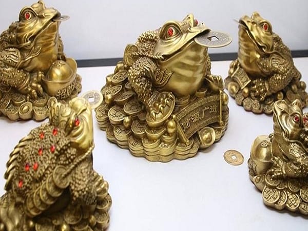 Ý nghĩa phong thủy của cóc ngậm tiền
