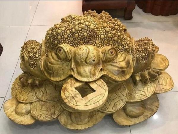 Ý nghĩa phong thủy của cóc ngậm tiền