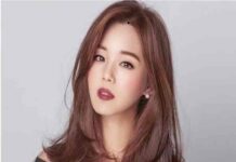 nốt ruồi trên trán gần chân tóc bên trái